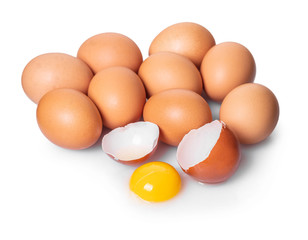 broken and whole chicken eggs
