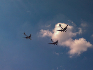 Planes in the air against the blue sky.