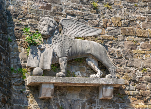Lion of Saint Mark on the wall of historic Castle in Gorizia, Italy