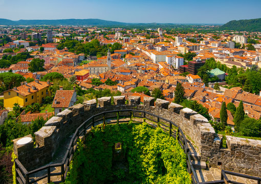 Aerial view of Gorizia city centre and semi-circular bastion of medieval castle, Friuli Venezia Giulia, Italy