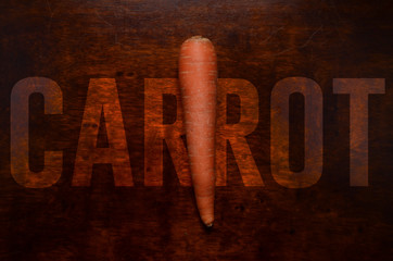Carrot on wooden table. Healthy organic orange vegetable food carrot is single in the kitchen with...