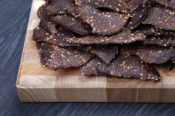 dried beef slices in spices with sesame seeds