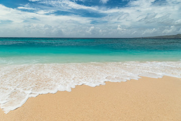 Beautiful Puka beach and blue sky at Boracay Island, Philippines.