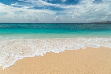 Fototapeta na wymiar Beautiful Puka beach and blue sky at Boracay Island, Philippines.