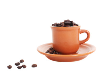 cup and coffee beans isolated over white background