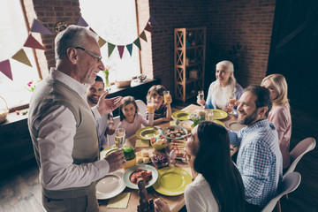 Nice lovey cheerful family son daughter enjoying domestic house 