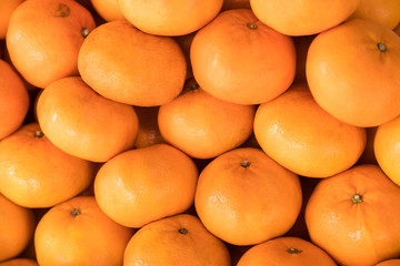 Mandarin Oranges pile put together looking from top view