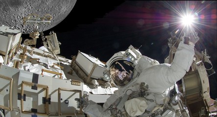 astronaut with bright light outside his spaceship © mgs
