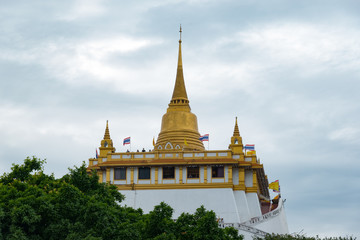 Fototapeta premium The Golden Mount at Wat Saket, Travel Landmark of Bangkok THAILAND