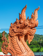 Fototapeta na wymiar Dragons on Wat Sila Ngu (Red Temple) on koh Samui island