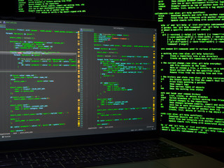 Haker looking for backdoors and exploiting vulnerability to steal identity. Cyber crime