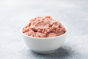 Baked chicken pate in a plate on the table. Close up