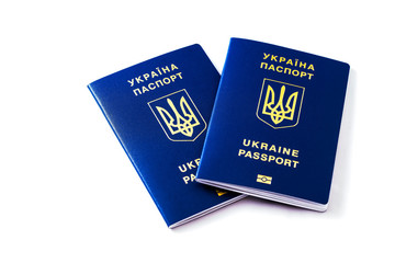 Two Ukrainian international biometric passport on white background
