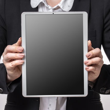 woman holds new tablet