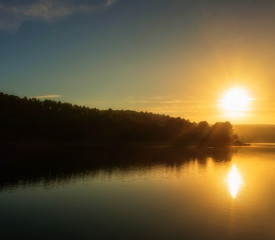 Sunset in the ruidera lagoons with the golden sky