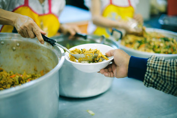 People are experiencing a lot of poverty. Come and wait for free food.