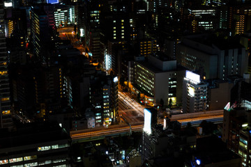 Tokyo city and skyline with night light  and railway