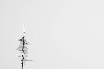 old televisions antenna in urban - monochrome