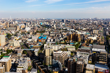 Fototapeta na wymiar Tokyo city with train railway and Biomass powerplant in sky view