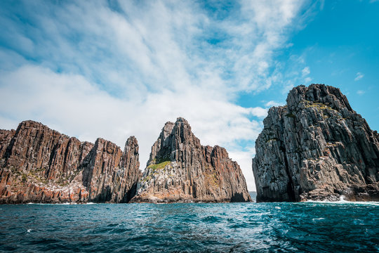 View To The Totem Pole Of Cape Hauy, Rough Coastline With Dolerite Cliffs, Tasmania, Australia