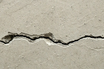 texture crack in concrete wall close-up