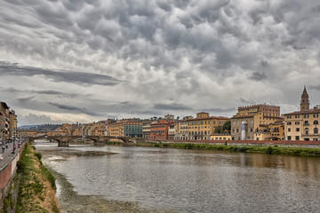 Fototapeta premium Florence or Firenze city view on Arno river, landscape with reflection. Tuscany, Italy.