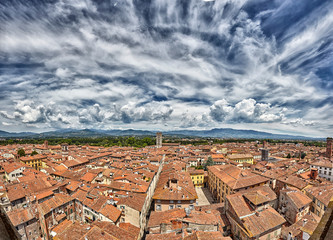 View over Italian town Lucca with typical terracotta roofs