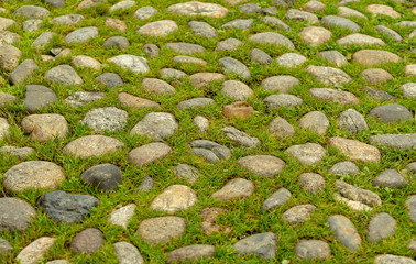 Cobblestone texture, stone block floor of pavement