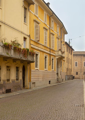 Fototapeta na wymiar Old streets in historical center of Italian town Parma Italy