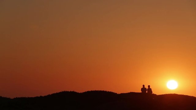 couple watching the sunset