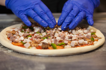 cooking pizza in a restaurant
