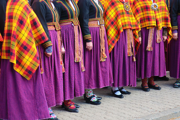 Several women in latvian traditional folk costume singing - obrazy, fototapety, plakaty