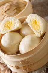 Chinese Steamed Creamy Custard Bun close-up. vertical