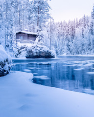 Blue winter river cabin 