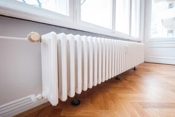Fotobehang radiator and thermostat in flat -  heater closeup © hanohiki