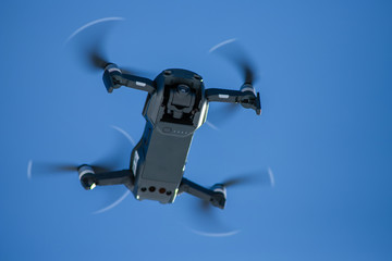 drone flies in the mountains