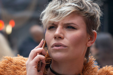 Portrait of young woman talking on cell phone