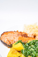 Grilled salmon with potato and spinach