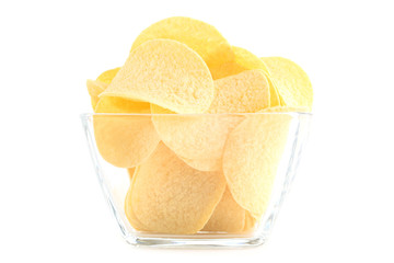 Potato chips in glass bowl isolated on white background