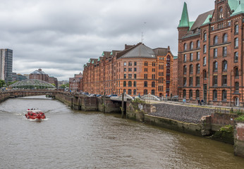 Obraz premium Hamburg, Germany - built between 1883 and 1927, the Hamburg Speicherstadt is the largest warehouse district in the world, and a Unesco World Heritage site