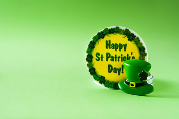 St Patrick Day hat on green background. Copyspace