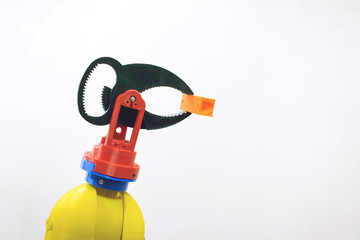 Naklejka premium 3D printed robot clamp, arm, holder. Plastic manipulator, robotic hand machine tool printed on three dimensional printer. DIY robotics, engineering, science, technology, computer code