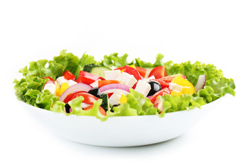 Vegetable salad in bowl isolated on white background