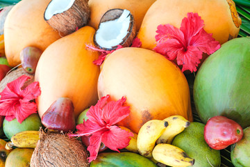 Tropical fruits background, many colorful ripe tropical fruits