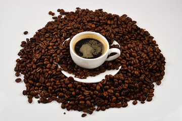 Cup of coffee and coffee beans.