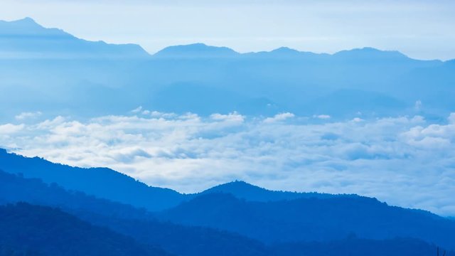 Beautiful Mist Floating Around Valleys 4K Time Lapse (zoom out)