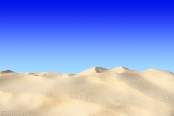 Sand on blue sky background.