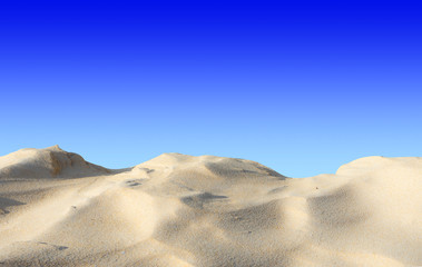 Sand on blue sky background.