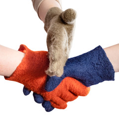 hand of witness breaks handshake in woolen gloves