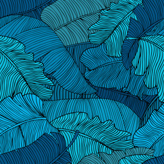 Seamless pattern of exotic, bright blue banana leaves closeup.